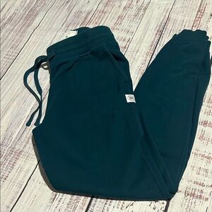 REIGNING CHAMP MIDWEIGHT TERRY SLIM SWEATPANT